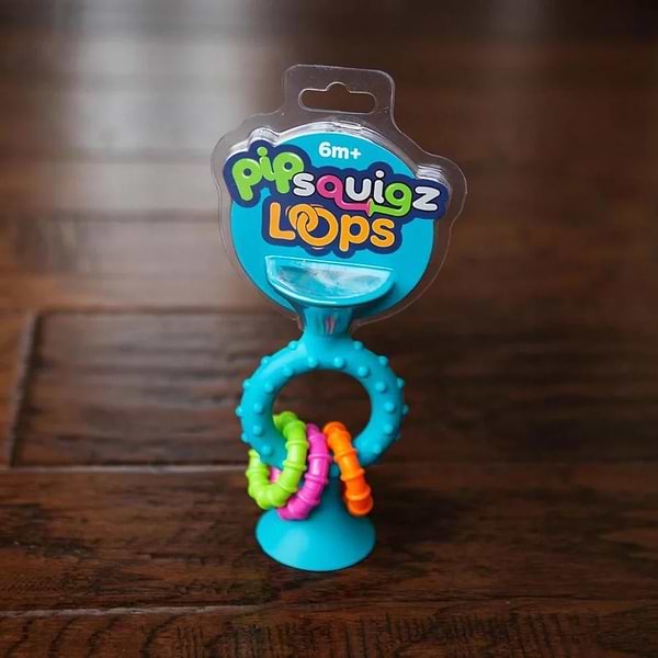 Фото - Брязкальце Fat Brain Toys pipSquigz Loops бірюзовий (F166ML)