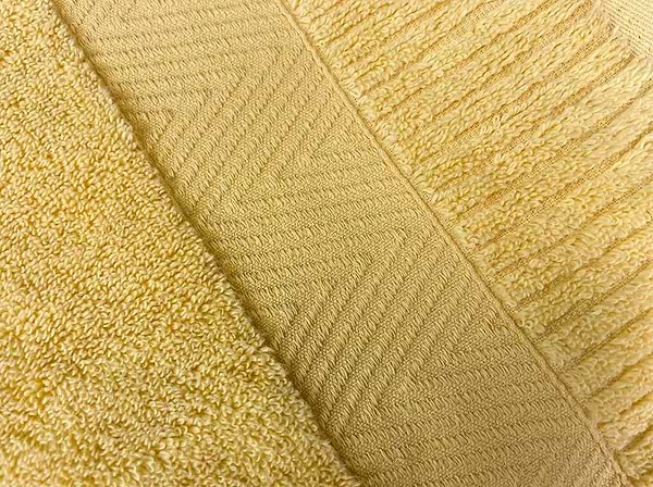 Фото - Рушник для обличчя GM Textile жовтий махровий зеро твіст з бордюром 50х90