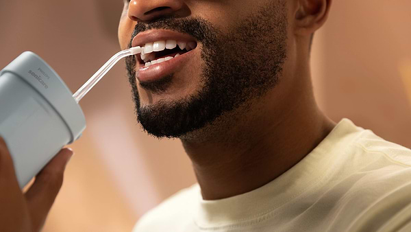 Фото - Ирригатор Philips Sonicare HX3333/24 Compact Flosser 1000