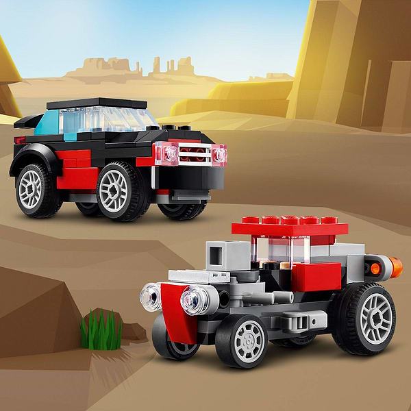 Фото - Конструктор LEGO Creator Бортовой грузовик с вертолетом (31146)