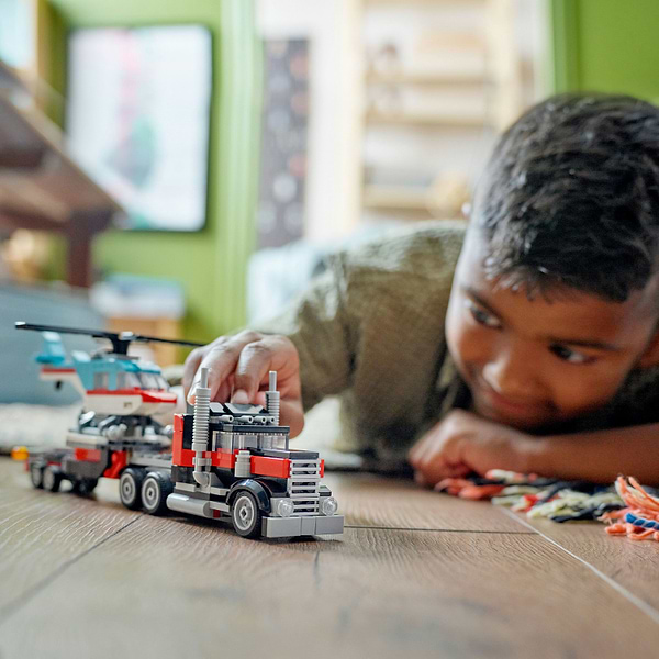 Фото - Конструктор LEGO Creator Бортовой грузовик с вертолетом (31146)