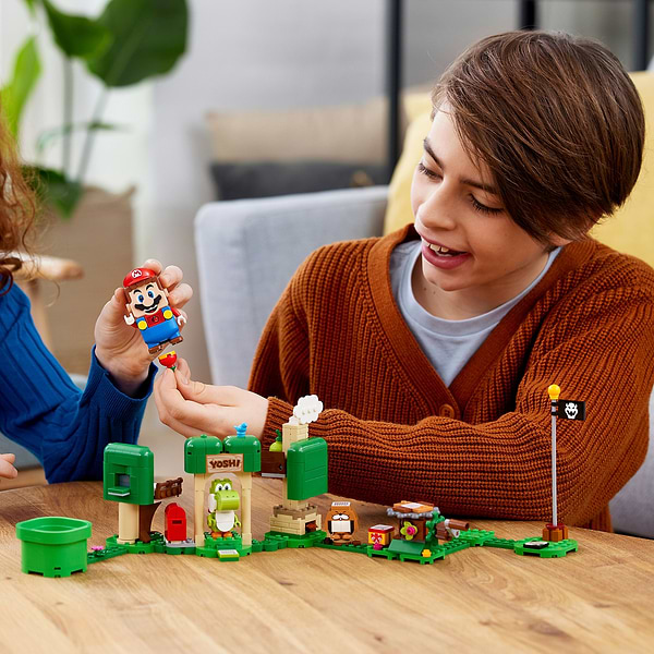Фото - Конструктор LEGO Super Mario Додатковий набір «Будинок подарунків Йоші» (71406)