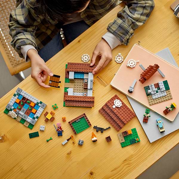 Фото - Конструктор LEGO Minecraft Заброшенная деревня (21190)