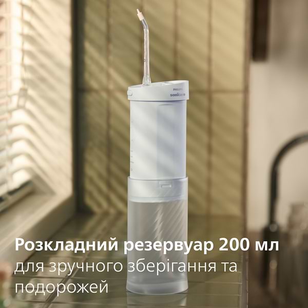 Фото - Ирригатор Philips Sonicare HX3333/24 Compact Flosser 1000