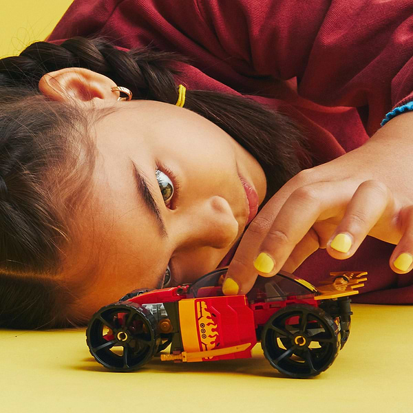 Фото - Конструктор LEGO Ninjago Гоночний автомобіль ніндзя Кая EVO (71780)