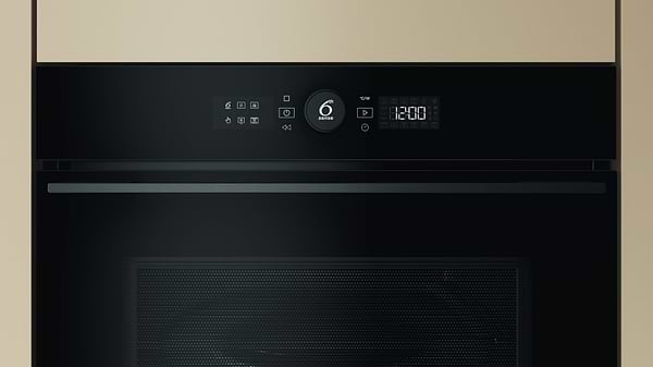 Фото - Духовой шкаф-СВЧ Whirlpool WMW57DMB