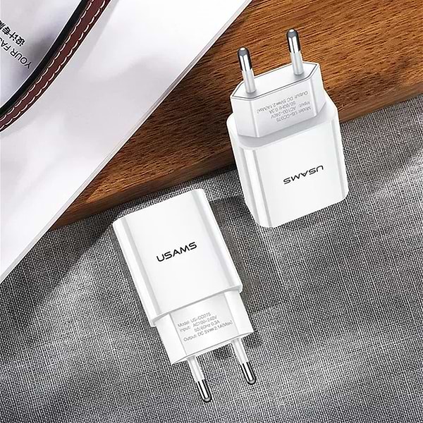 Фото - Сетевое зарядное устройство Usams US-CC090 T24 2.1A Dual USB 10W Travel Charger White (CC90TC01)