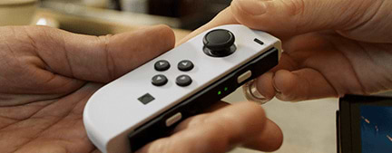 Фото - Игровая приставка портативная Nintendo Switch OLED (White)