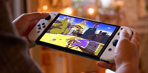 Фото - Игровая приставка портативная Nintendo Switch OLED (White)