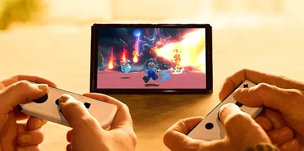 Фото - Игровая приставка портативная Nintendo Switch OLED (White)