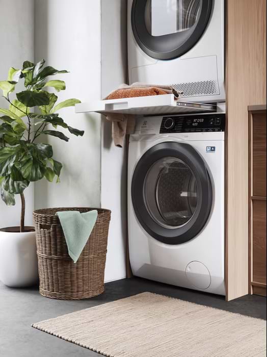 Фото - Комплект техники Electrolux Стиральная машина с фронтальной загрузкой + Сушильная машина + Комплект креплений для установки в колонну Electrolux EW7F3414U + EW7D394U + E1WYHSK2