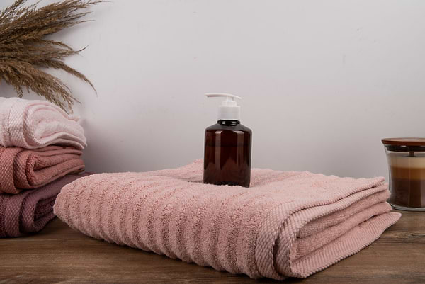 Фото - Полотенце банное GM Textile махровое Бабл Зеро Твист светло-коралловый 70х140