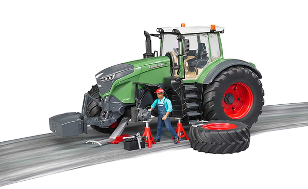 Фото - Наземная строительная техника BRUDER Трактор Fendt 1050 Vario с фигуркой и аксессуарами для ремонта (04041)