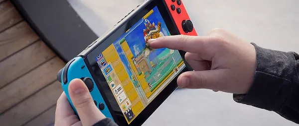 Фото - Игровая приставка портативная Nintendo Switch (Neon Blue/Red)