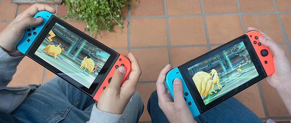 Фото - Игровая приставка портативная Nintendo Switch (Neon Blue/Red)
