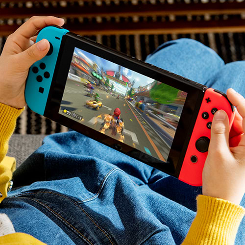 Фото - Игровая приставка портативная Nintendo Switch (Neon Blue/Red)