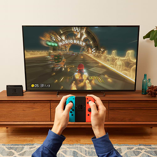 Фото - Игровая приставка портативная Nintendo Switch (Neon Blue/Red)