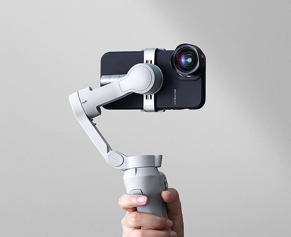 Фото - Трёхосевой ручной стабилизационный подвес DJI Osmo Mobile 4
