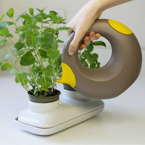 Фото - Лейка для игры в песочнице Quut Cana Brown/Yellow (170594)